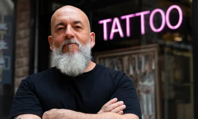 elderly person with tattoos